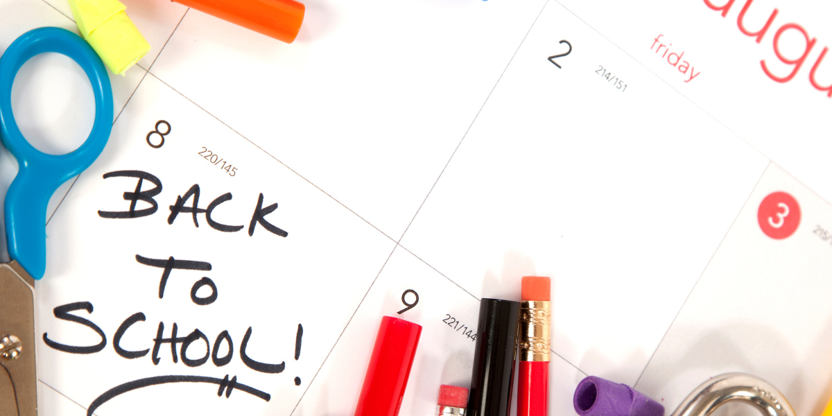 Image of a calendar turned to August with the words Back to School written on it along with some other school supplies.