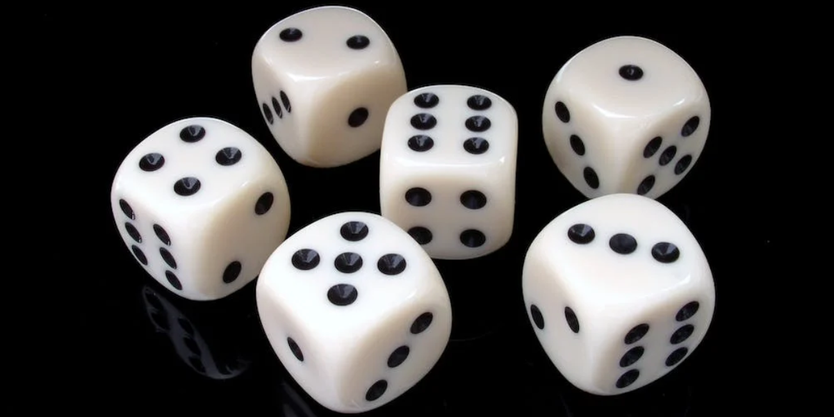 Rolling dice to teach counting.